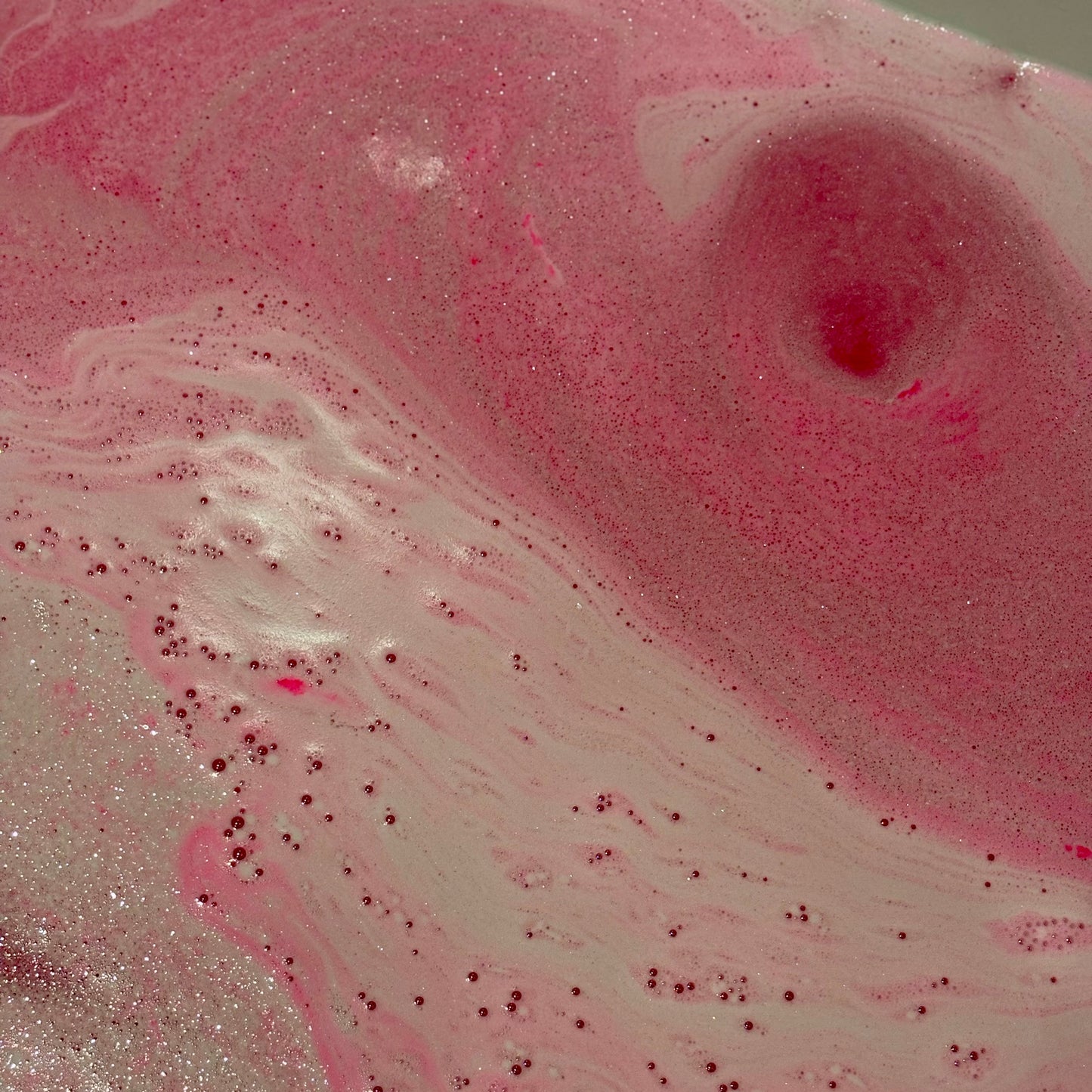 handmade, natural vanilla and cranberry scented bath bomb