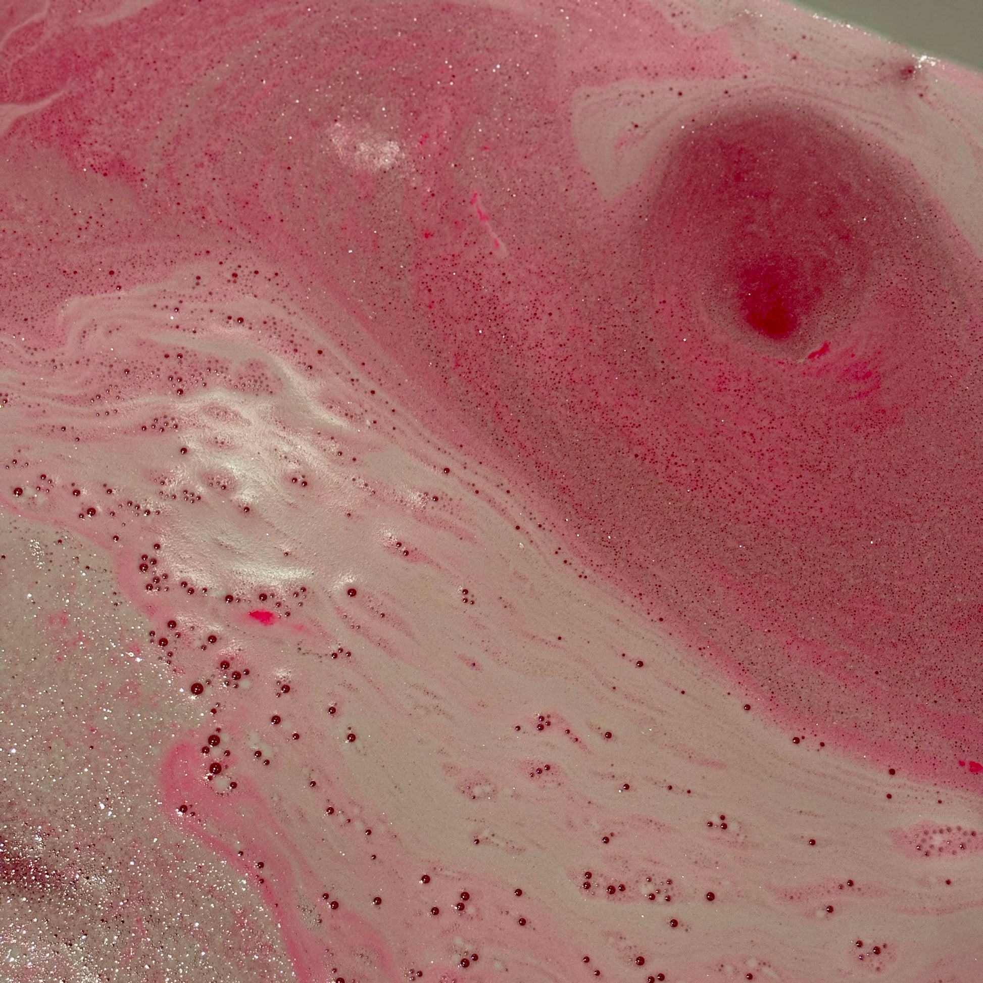 handmade, natural vanilla and cranberry scented bath bomb